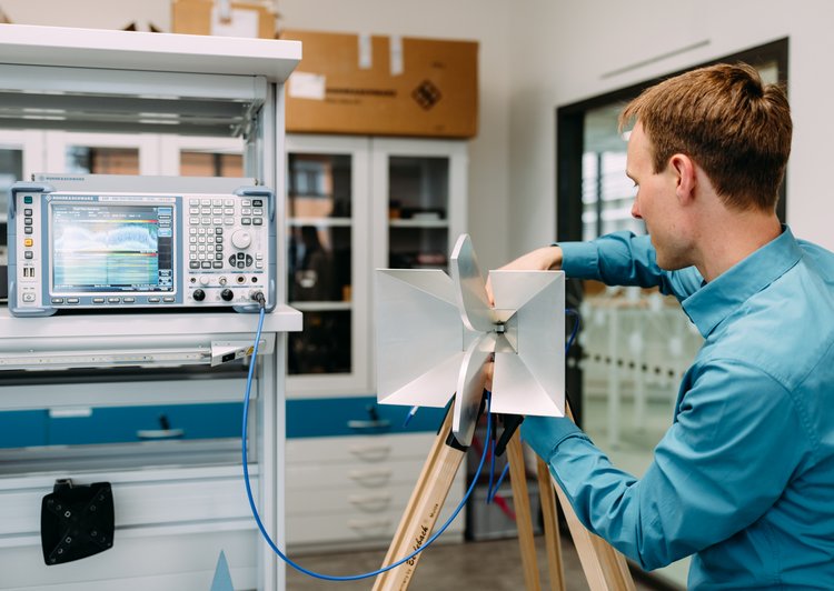 Researcher with measuring equipment in the lab