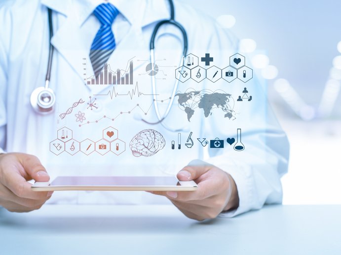 doctor with digital, holographic medical chart