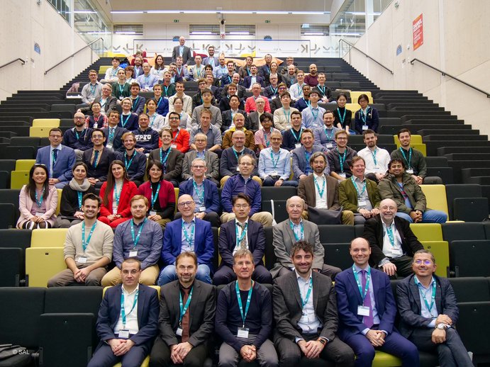 Group of people sitting in a lecture room