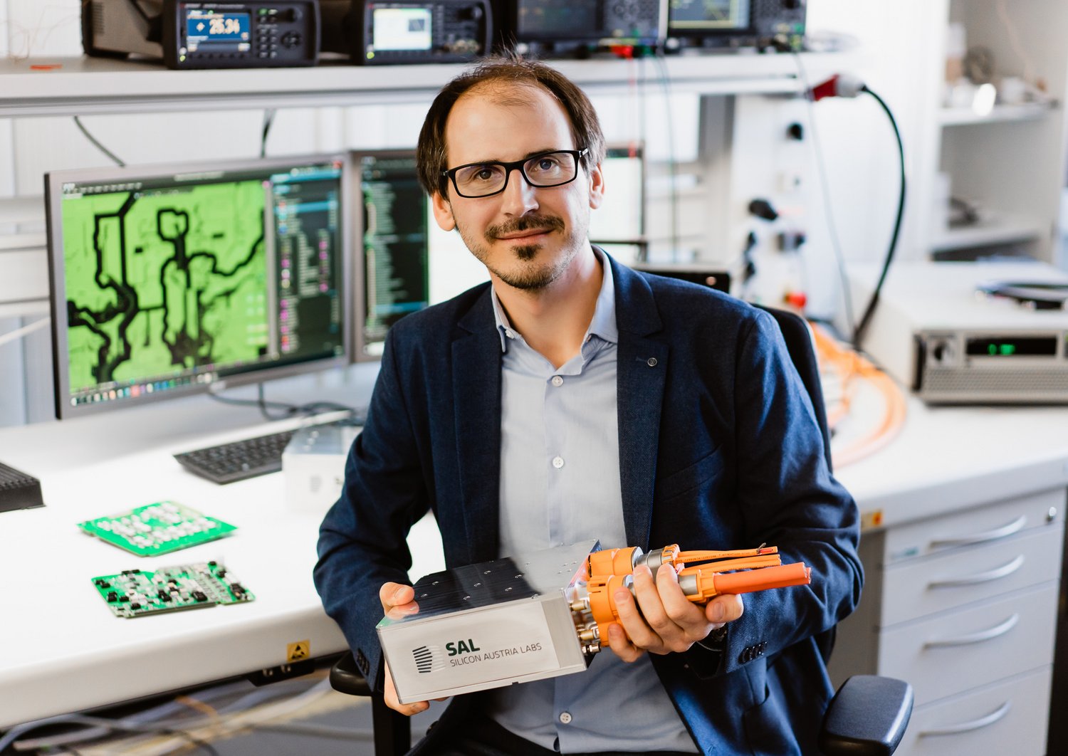 Christian Mentin, project leader "Tiny Power Box" holds the box in his hand