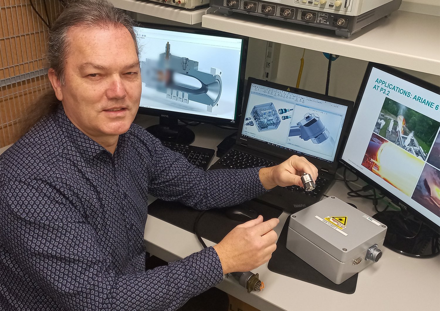 Gerhard Kroupa with the ignition laser in the lab